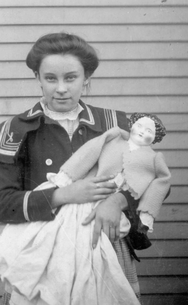 Young resident of Zoar with her doll, ca. 1890. Via Ohio Memory.