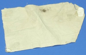 Scrap of fabric from the Wright Brothers' plane, courtesy of the National Museum of the United States Air Force via Ohio Memory.