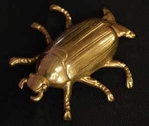 "Gold bug" (actually made of brass) from McKinley's first presidential campaign, when he advocated remaining with the gold standard. Courtesy of the McKinley Memorial Library via Ohio Memory.